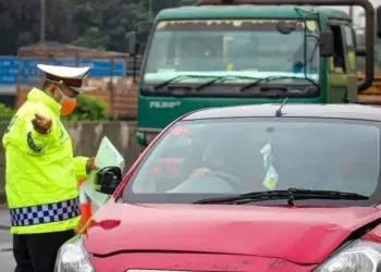 Disekat di Pintu Tol Bitung, 498 Kendaraan Batal Mudik