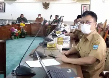 Kepala Dinkes Kabupaten Serang, Agus Sukmayadi, saat menghadiri rakor pembahasan penanganan Covid-19. (ISTIMEWA)