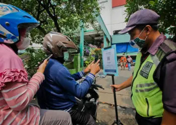 Potret Penerapan Aplikasi PeduliLindungi di Pasar Tradisional