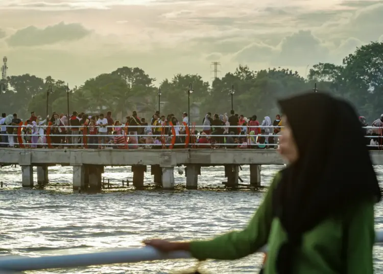 Foto Liburan Imlek di Kawasan Situ Cipondoh