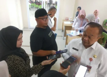 Plt Kepala Bapenda Provinsi Banten, E. A. Deni Hermawan. (LUTHFI/SATELITNEWS.COM)