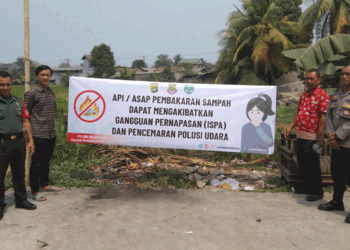 Sebar Spanduk Imbauan Larangan Bakar Sampah, Upaya Polsek Kelapa Dua Tekan Polusi Udara