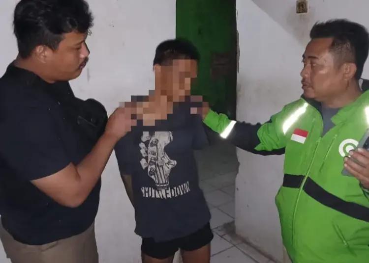 Tersangka pelaku pembunuhan di Teluknaga Ditangkap polisi. (ISTIMEWA)