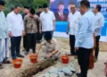 Peletakan batu pertama, pembangunan dapur MBG atau SPPG, di Ponpes Bai Mahdi Sholeh Ma'mun milik Yandri Susanto dan Ratu Zakiyah, Minggu (2/2/2025). (ISTIMEWA)